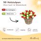 Preview: Handbemalte Tulpen aus Holz in Rot und weiß, 50 Stück, stehend in einem Weidenkorb