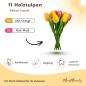 Preview: zwei handbemalte Tulpenstäuße aus Holz in pink und gelb, je 11 Stück, stehend und liegend